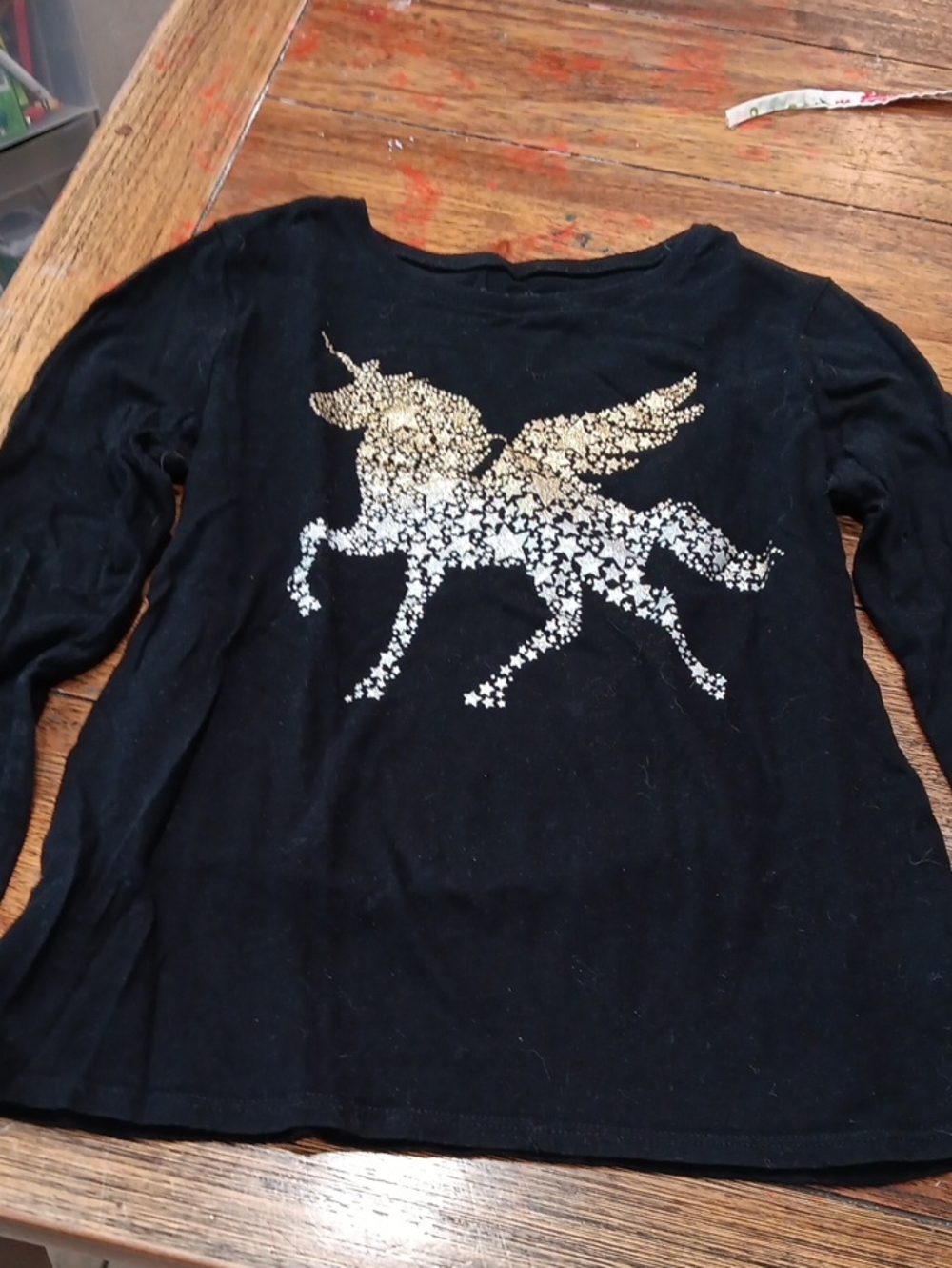 Place Black Long-Sleeve Tee with Gold Star Unicorn